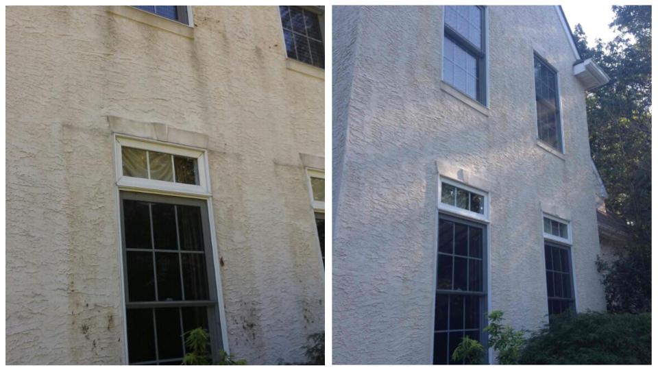 Residential home exterior being professionally soft washed by Georgia Wash to remove mold, mildew, algae, pollen, and surface dirt without damaging siding or painted surfaces.